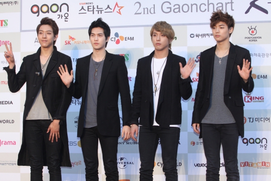 Idol rock band CNBLUE members Lee Jung-shin (left), Lee Jong-hyun (second to left), Jung Yong-hwa (second to right) and Kang Min-hyuk (right) at the 2nd Gaon Chart K-POP Awards at the Seoul’s Olympic Hall in Korea on February 13, 2013. (TenAsia/ Park Jin-soo)